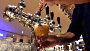 AB InBev продава австралийския си бизнес на японската Asahi за 11.3 млрд. долара